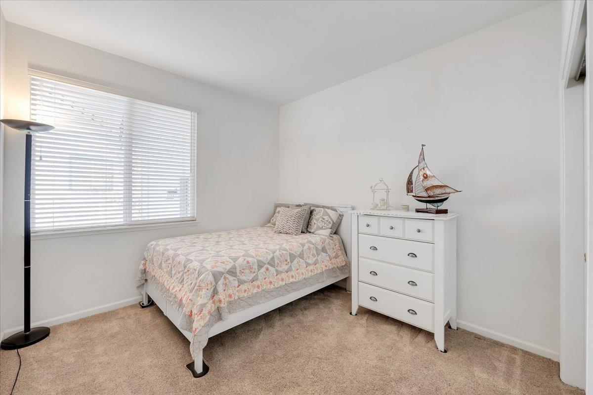 6250 Bluff View Road, Unit 60 Copperopolis, CA 95228 - Photo 28 of 75 a bedroom with a bed and a window