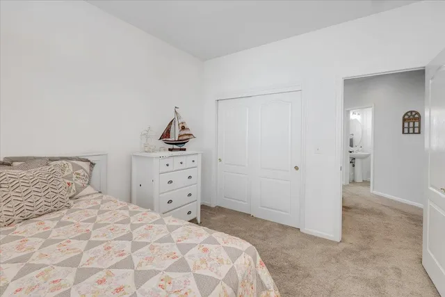 a spacious bathroom with a double vanity sink mirror double and shower