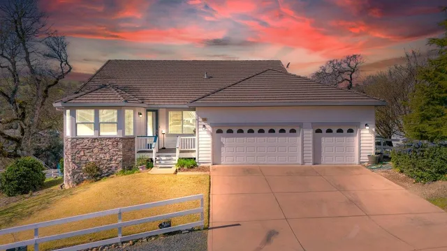 a view of front door of house with stairs