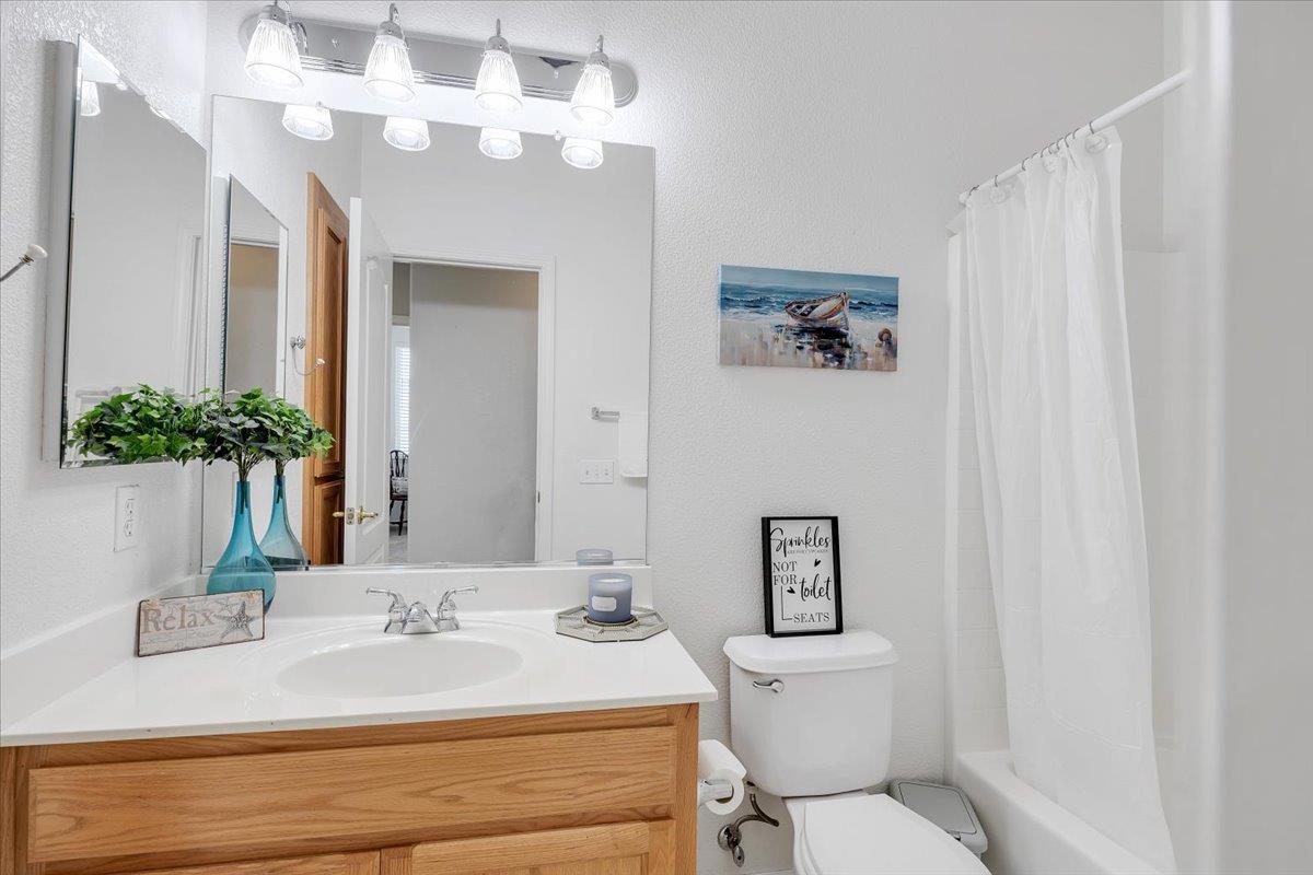 6250 Bluff View Road, Unit 60 Copperopolis, CA 95228 - Photo 33 of 75 a bathroom with a sink vanity granite and toilet