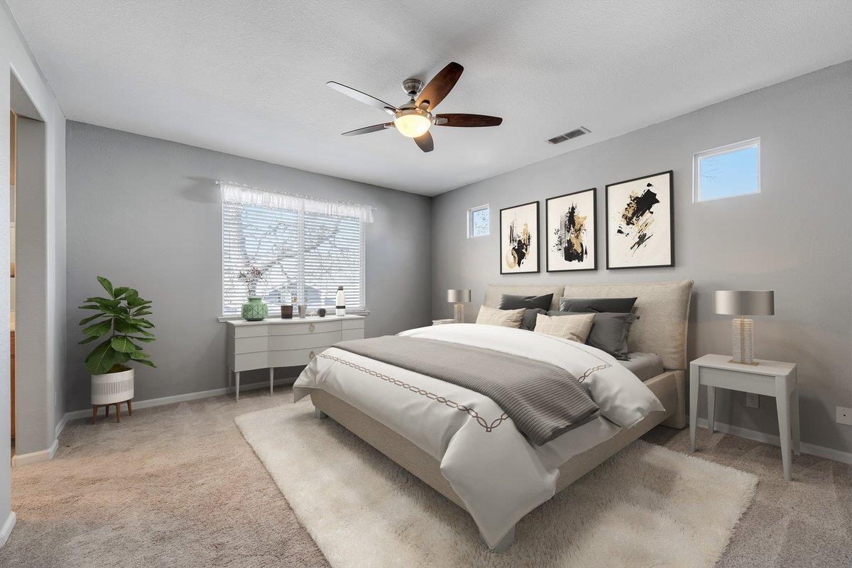 6250 Bluff View Road, Unit 60 Copperopolis, CA 95228 - Photo 35 of 75 a bedroom with a large bed and a window