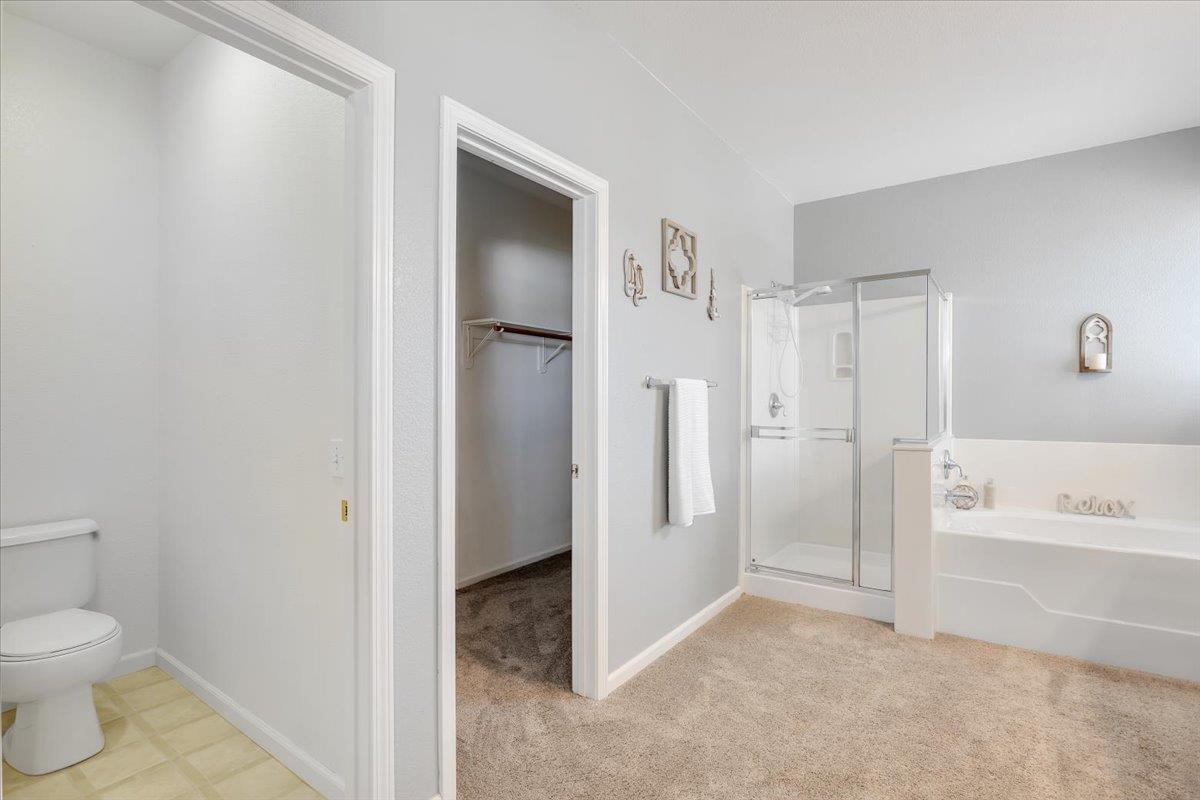 6250 Bluff View Road, Unit 60 Copperopolis, CA 95228 - Photo 38 of 75 a bathroom with a granite countertop sink and a mirror