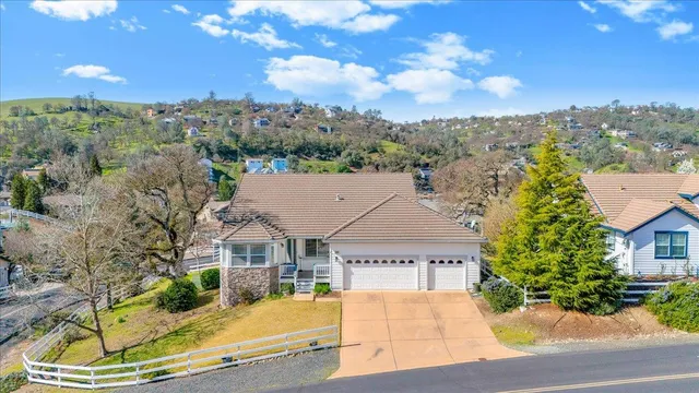 a view of a city with an ocean