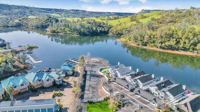 a front view of a building with a garden