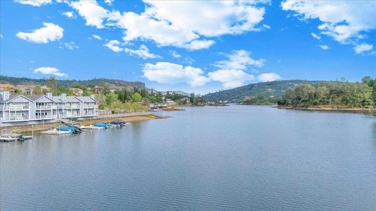 6250 Bluff View Road, Unit 60 Copperopolis, CA 95228 - Photo 64 of 75 a view of a lake with houses in the back