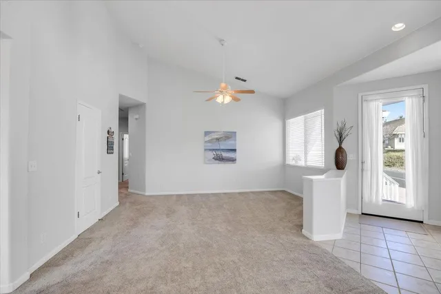 a kitchen with appliances a sink and cabinets