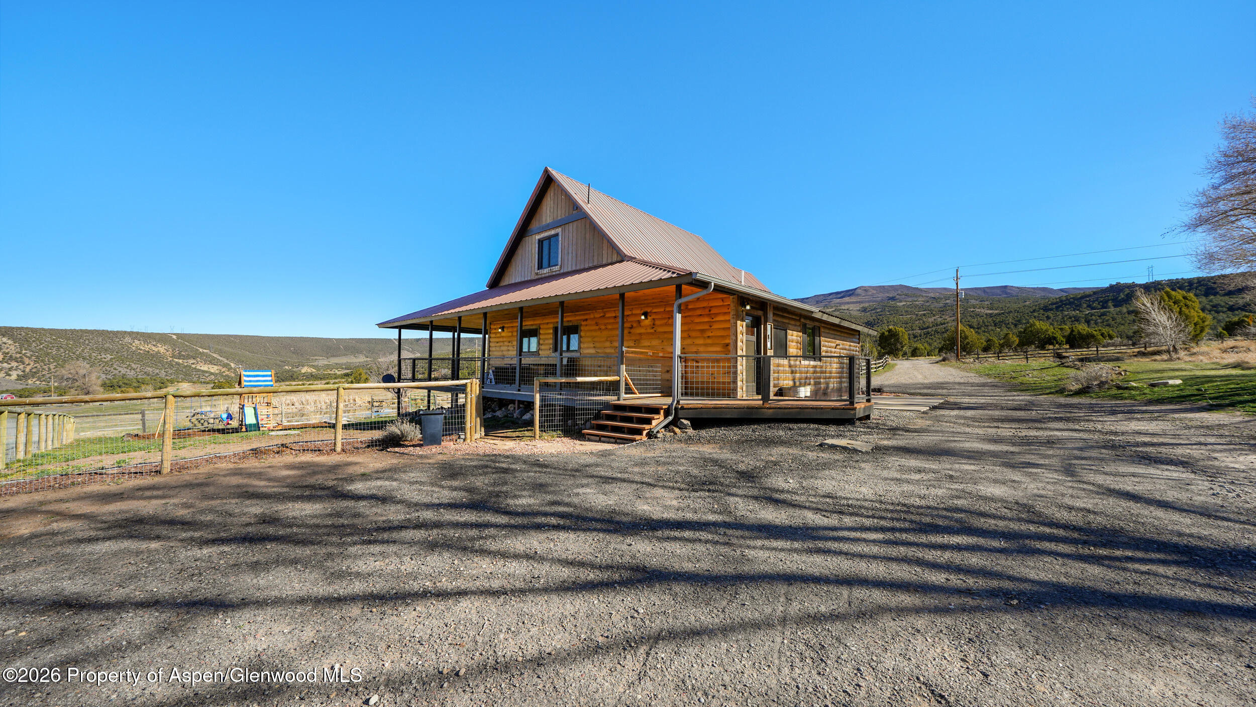 9109 County Road 320 Rifle, CO 81650 - Photo 26 of 38 a view of a house with a ocean view