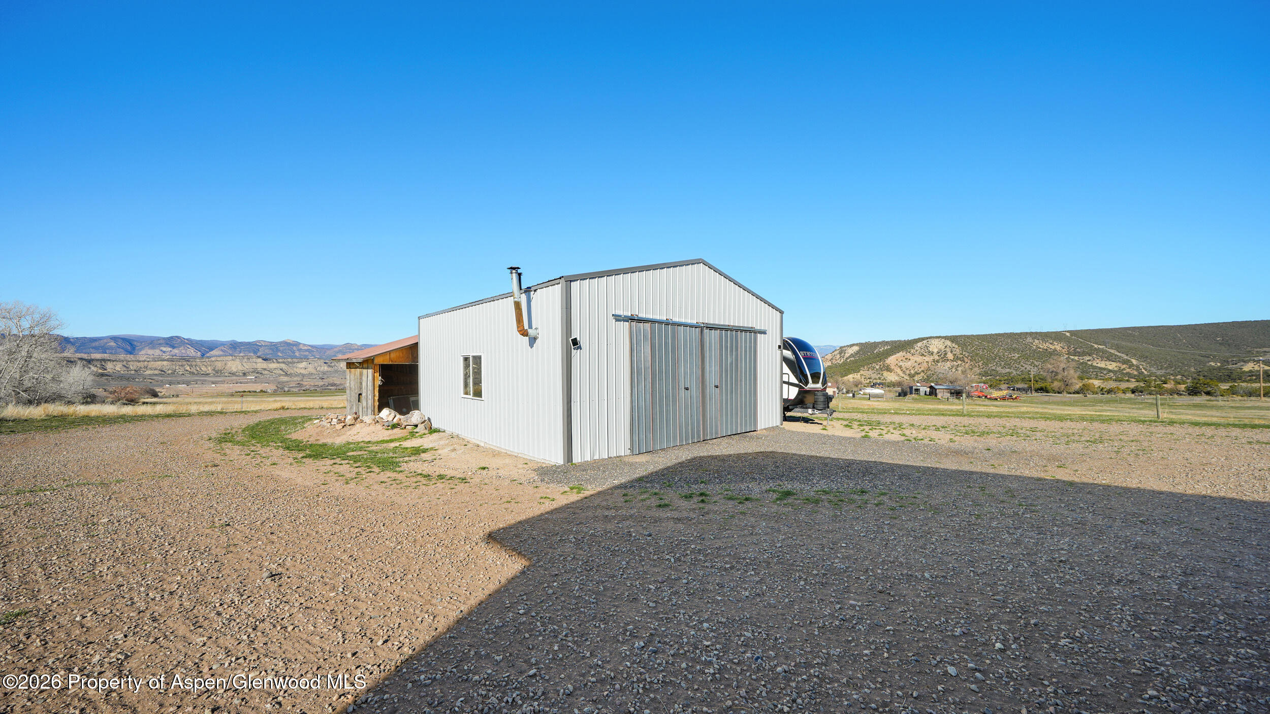 9109 County Road 320 Rifle, CO 81650 - Photo 30 of 38 a view of a terrace with a ocean view
