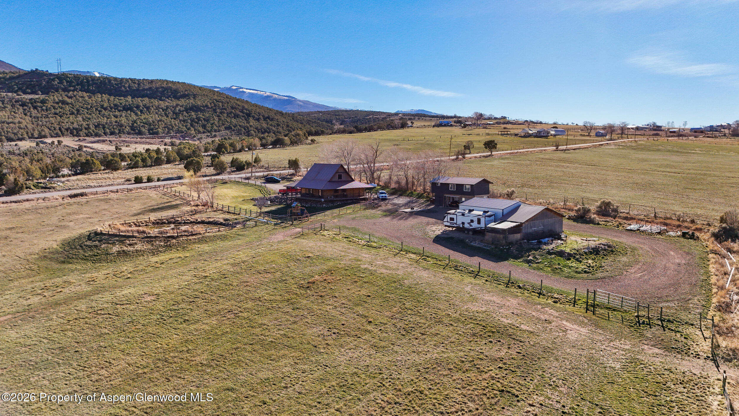 9109 County Road 320 Rifle, CO 81650 - Photo 31 of 38 a view of a lake with mountain