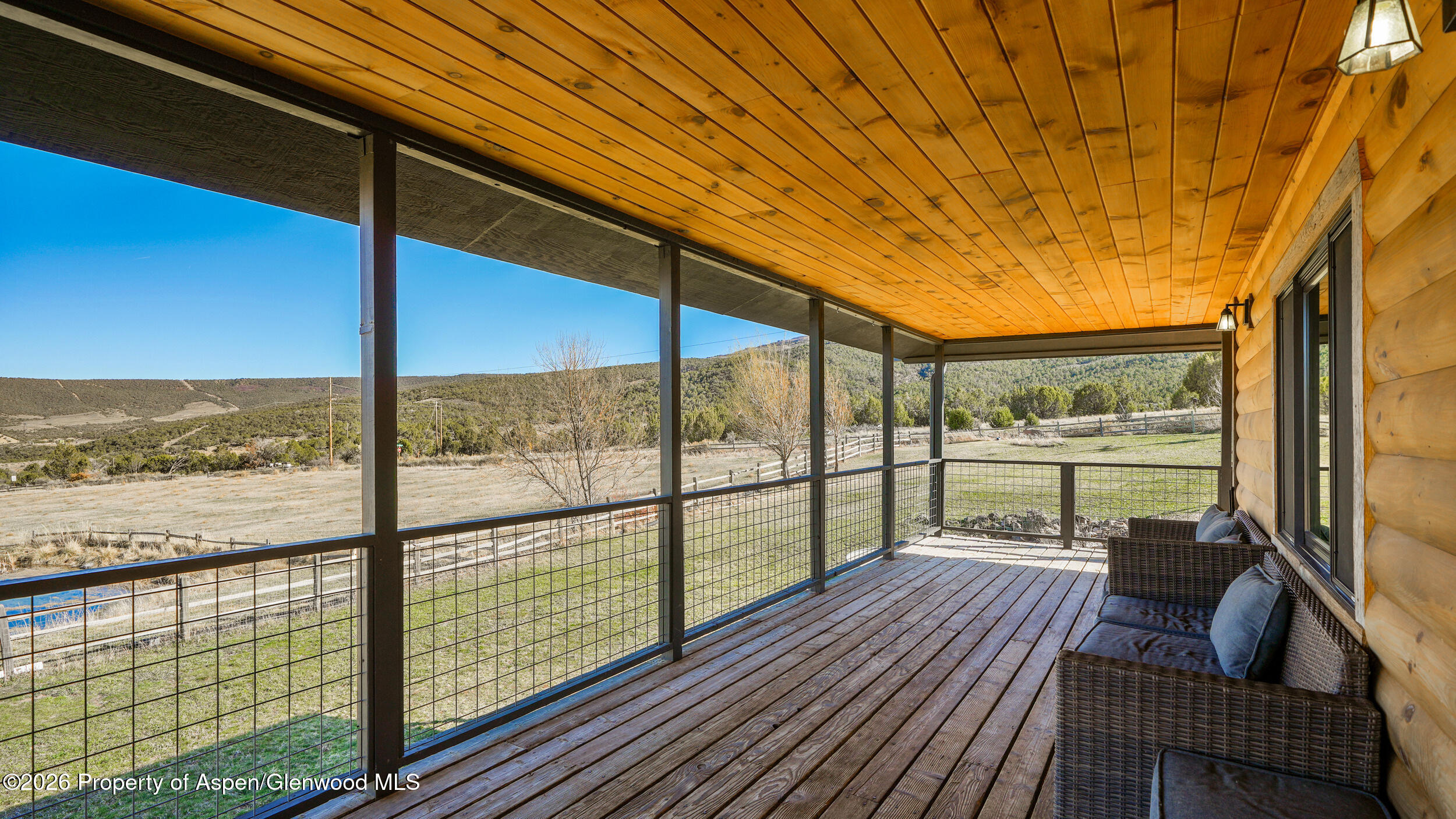 9109 County Road 320 Rifle, CO 81650 - Photo 6 of 38 a view of a balcony with lake view and a ocean view
