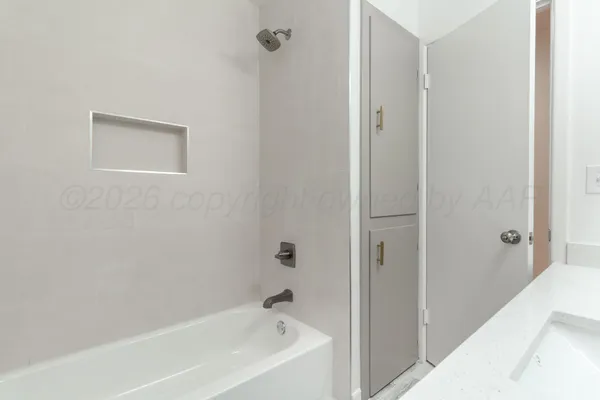 a bathroom with a bathtub