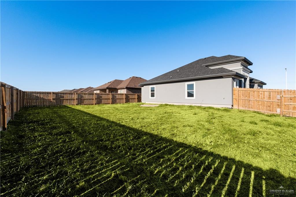 1271 Stirrup Circle San Benito, TX 78586 - Photo 14 of 18 a house view with a garden space