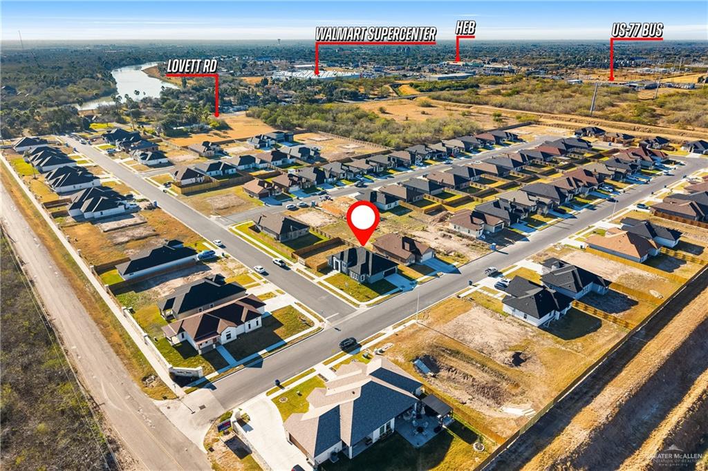 1271 Stirrup Circle San Benito, TX 78586 - Photo 17 of 18 an aerial view of residential houses with outdoor space