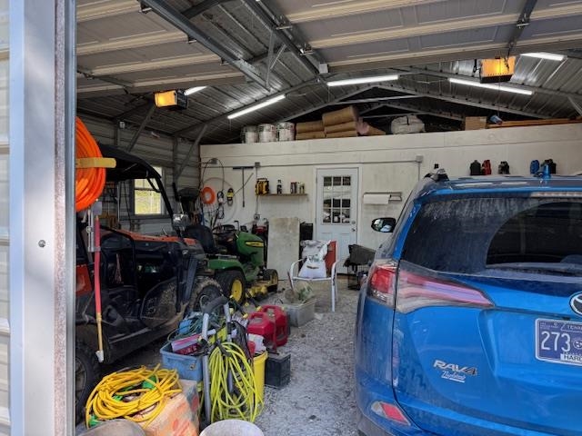 2551 Naylor Road Toone, TN 38381 - Photo 19 of 23 Garage with a garage door opener