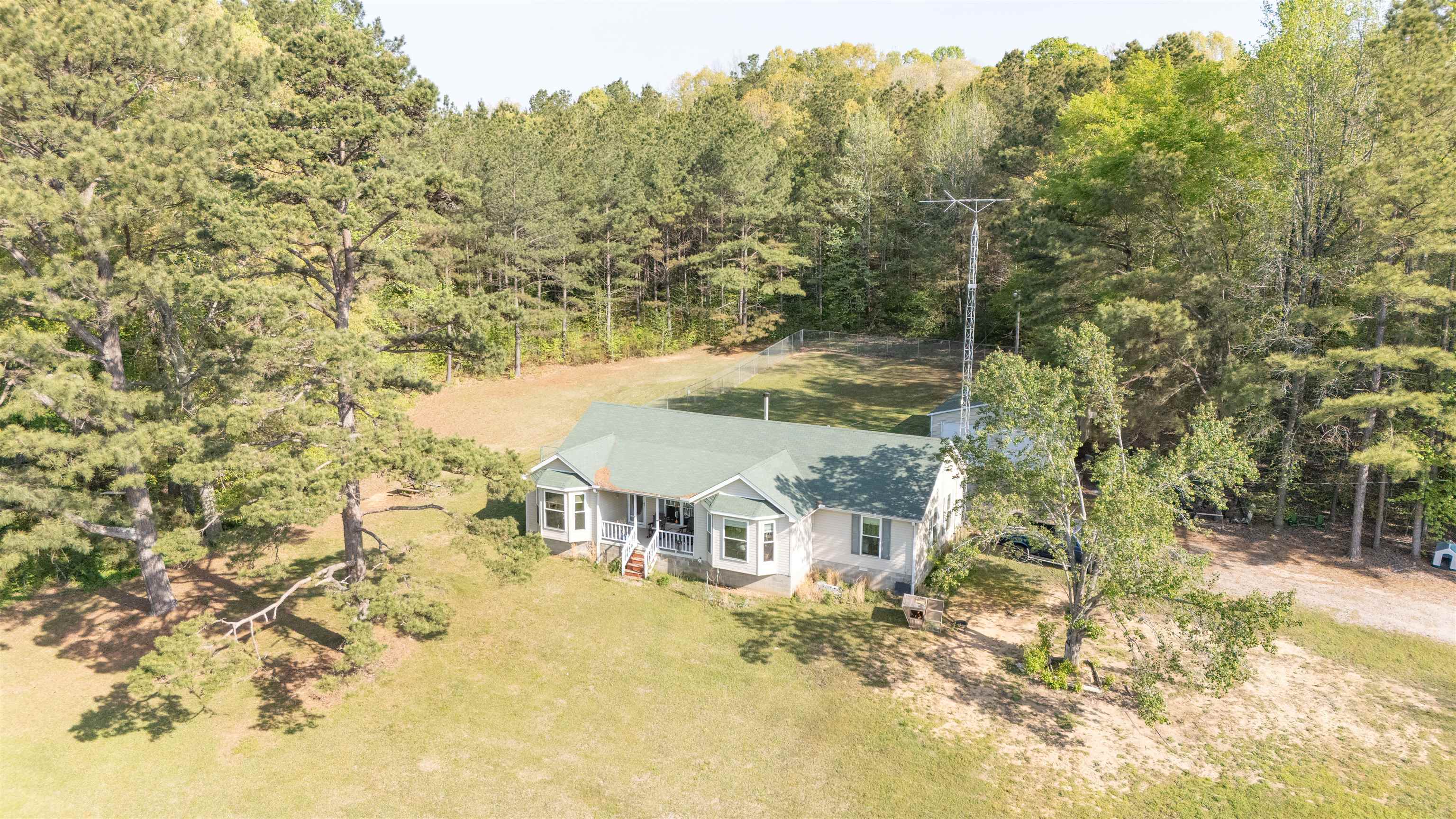 2551 Naylor Road Toone, TN 38381 - Photo 21 of 23 View of subject property with a heavily wooded area