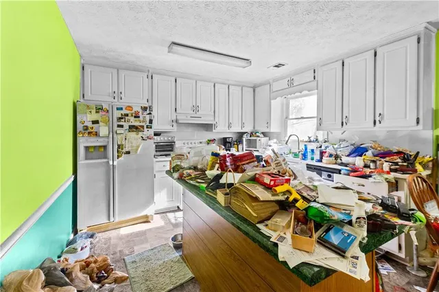 a room with furniture and a flat screen tv