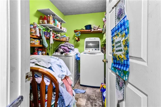 a room with furniture toys and a chandelier