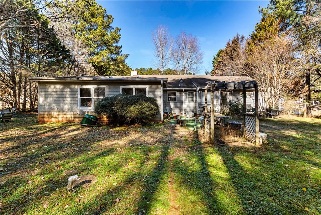 125 Laurel Way Covington, GA 30016 - Photo 6 of 21 a view of a house with pool and sitting area