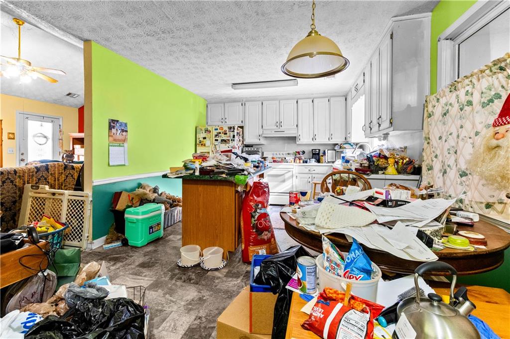 125 Laurel Way Covington, GA 30016 - Photo 10 of 21 a very nice looking room with many windows