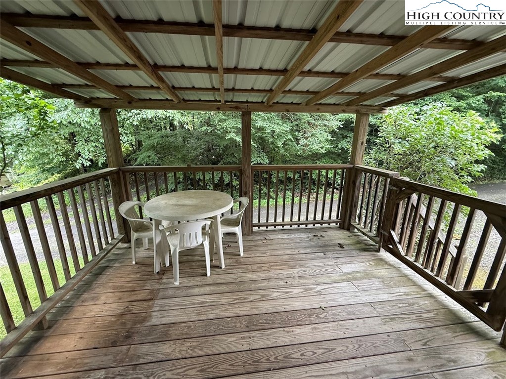 172 Ruania Way Lansing, NC 28643 - Photo 31 of 46 a view of a two chairs in the deck