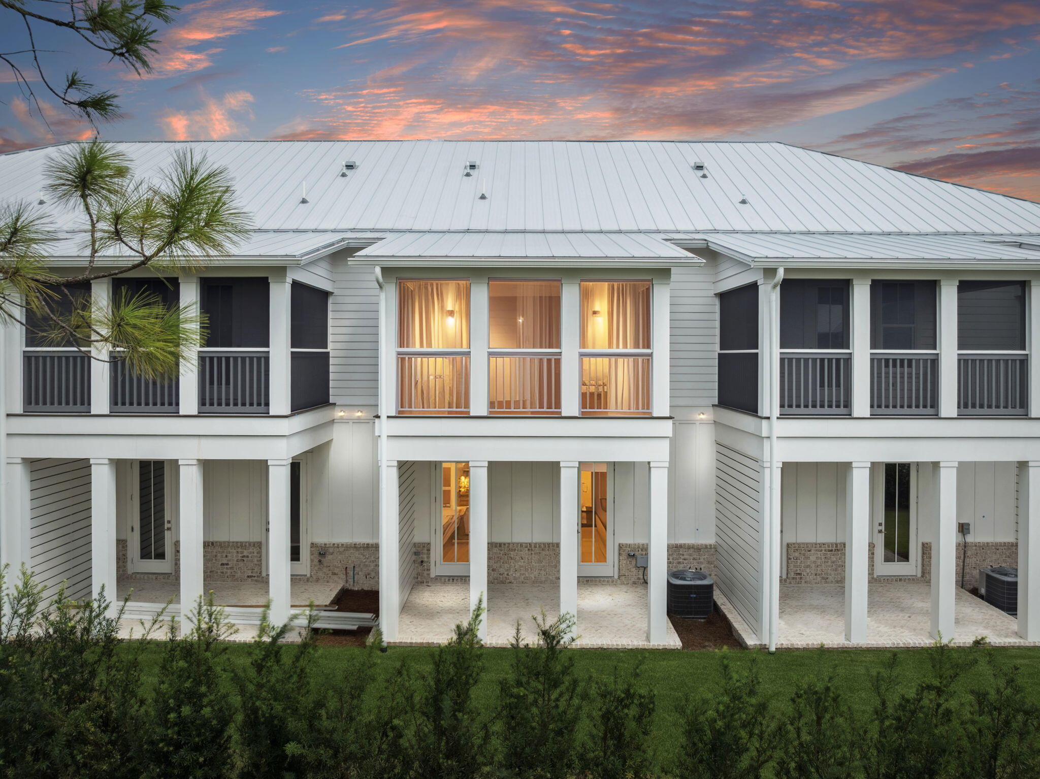 45 Grove Townhomes Place, Unit 101 Santa Rosa Beach, FL 32459 - Photo 1 of 36 a large brick building with a large windows