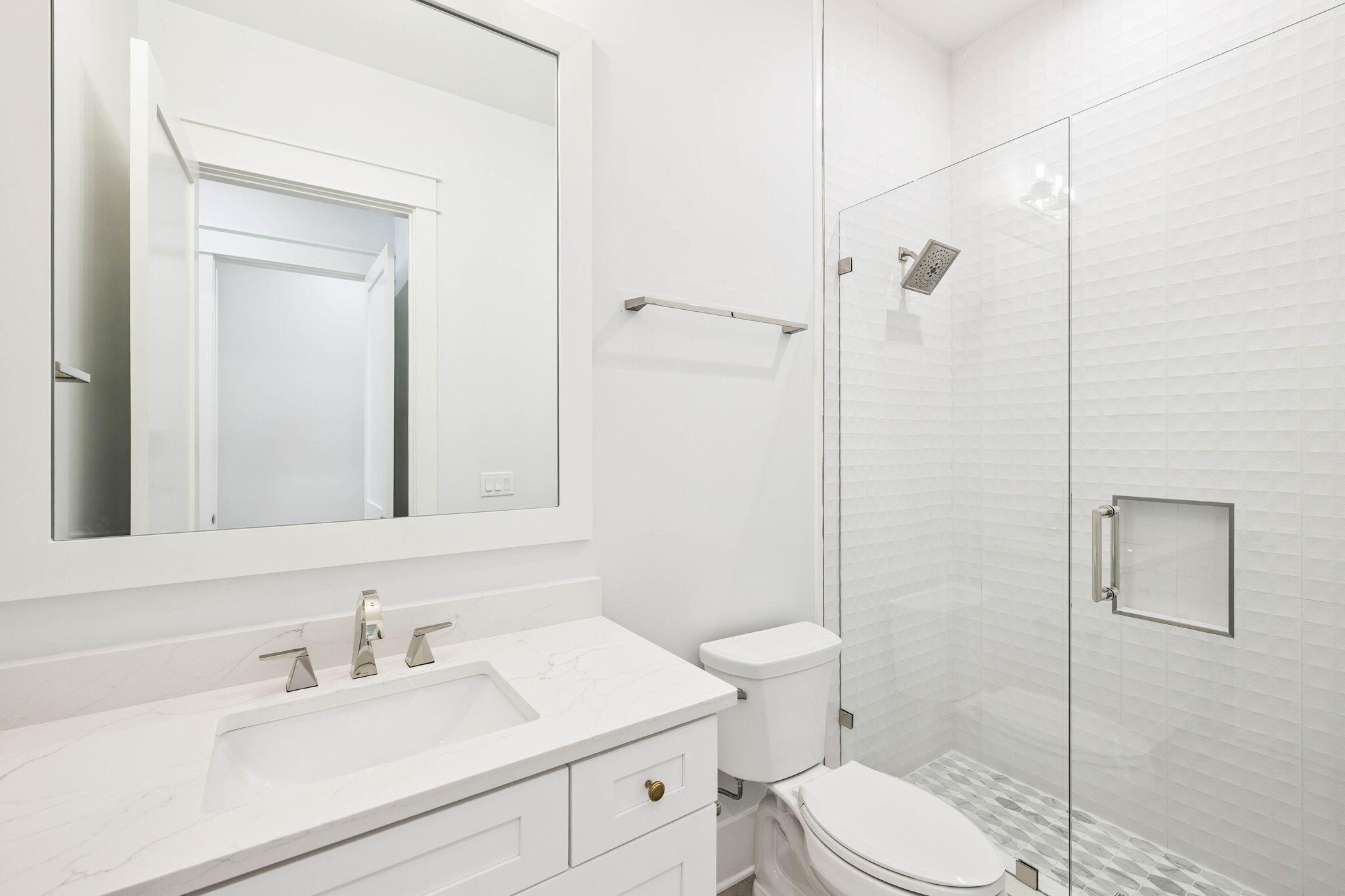 45 Grove Townhomes Place, Unit 101 Santa Rosa Beach, FL 32459 - Photo 26 of 36 a bathroom with a sink a toilet and shower