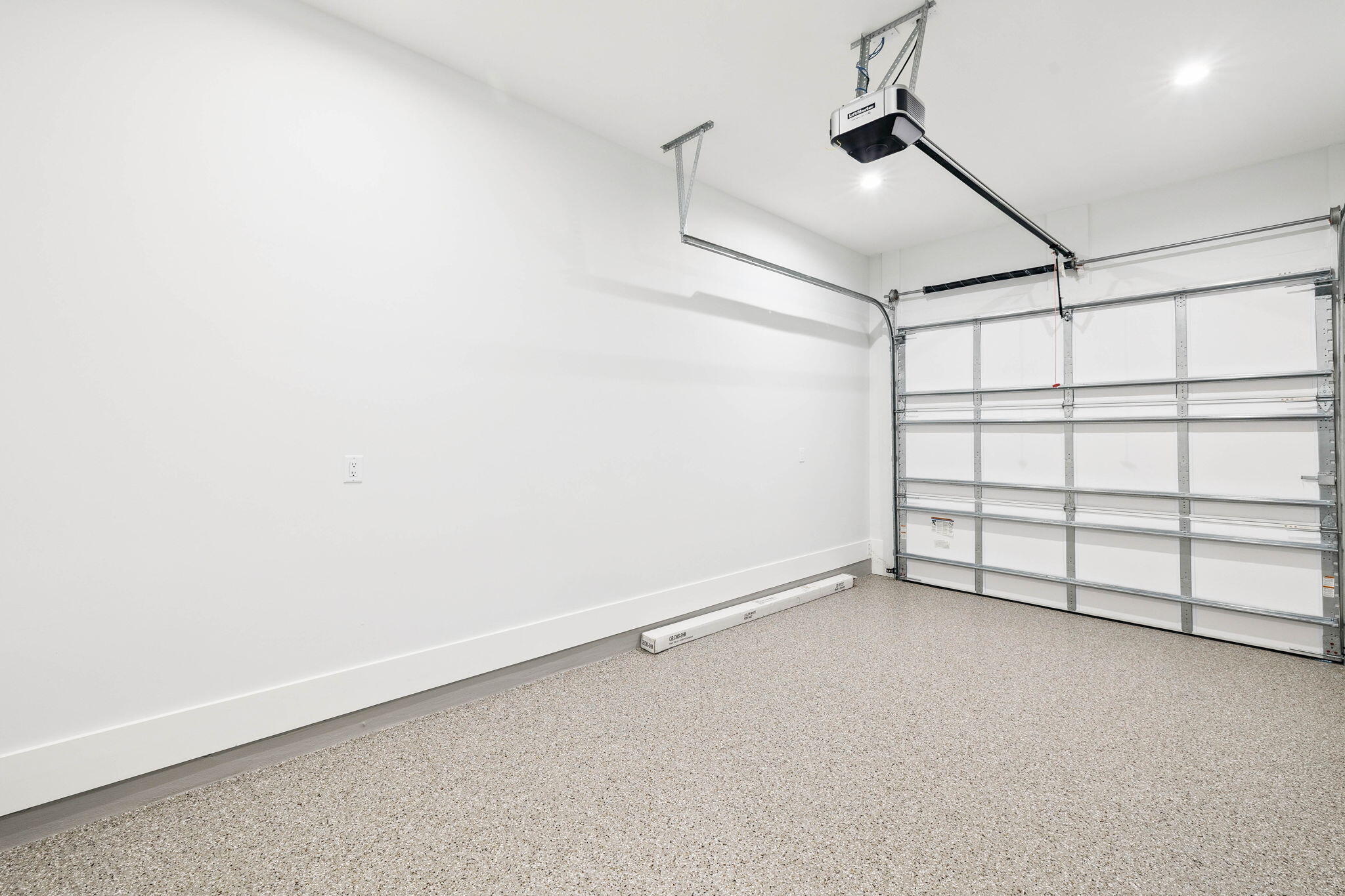 45 Grove Townhomes Place, Unit 101 Santa Rosa Beach, FL 32459 - Photo 33 of 36 a view of a garage