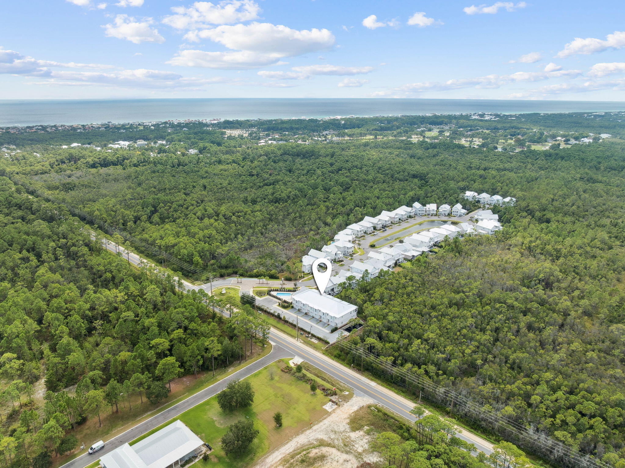 45 Grove Townhomes Place, Unit 101 Santa Rosa Beach, FL 32459 - Photo 6 of 36 a view of a city and an ocean