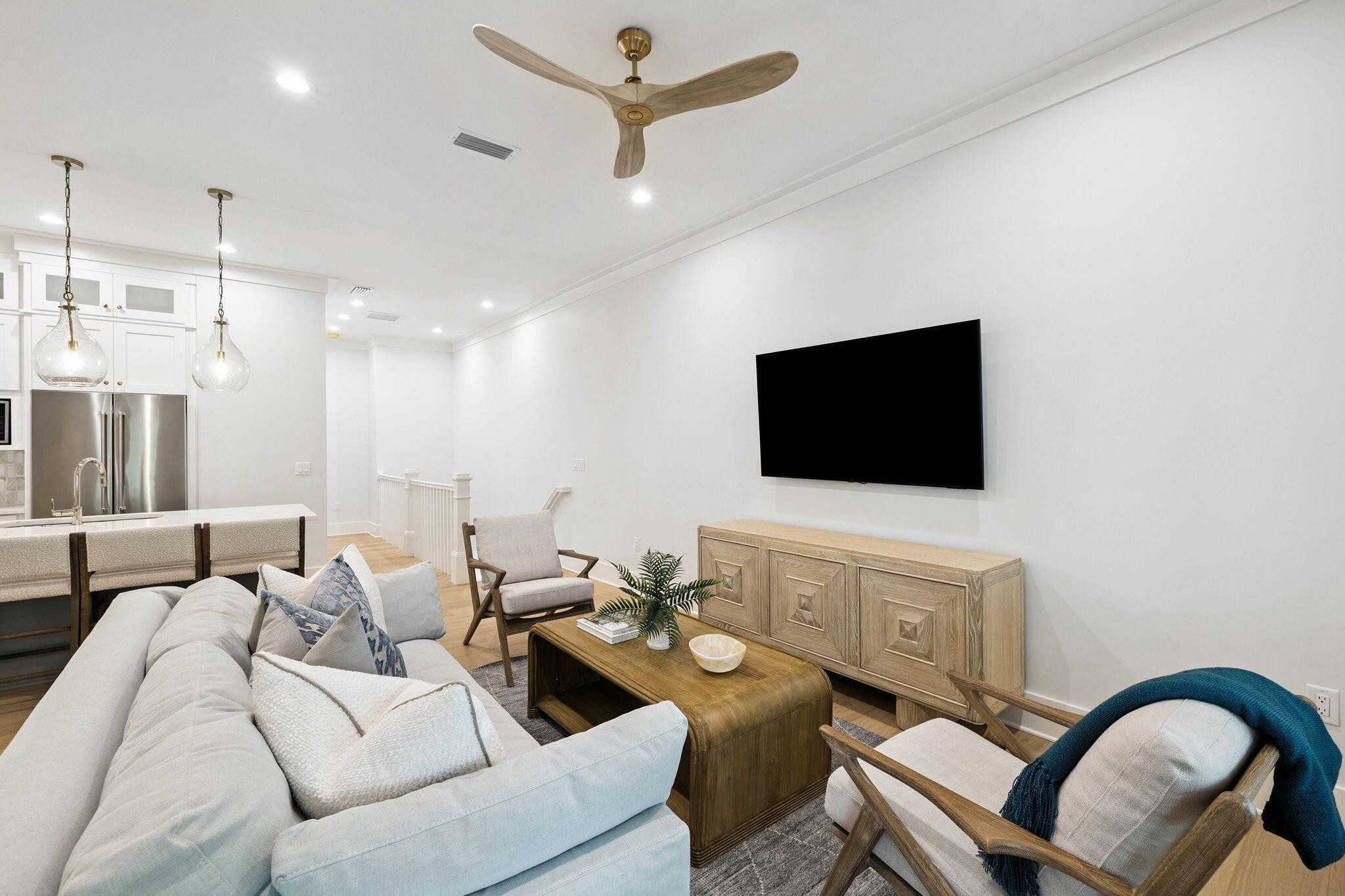 45 Grove Townhomes Place, Unit 101 Santa Rosa Beach, FL 32459 - Photo 9 of 36 a living room with furniture and a flat screen tv