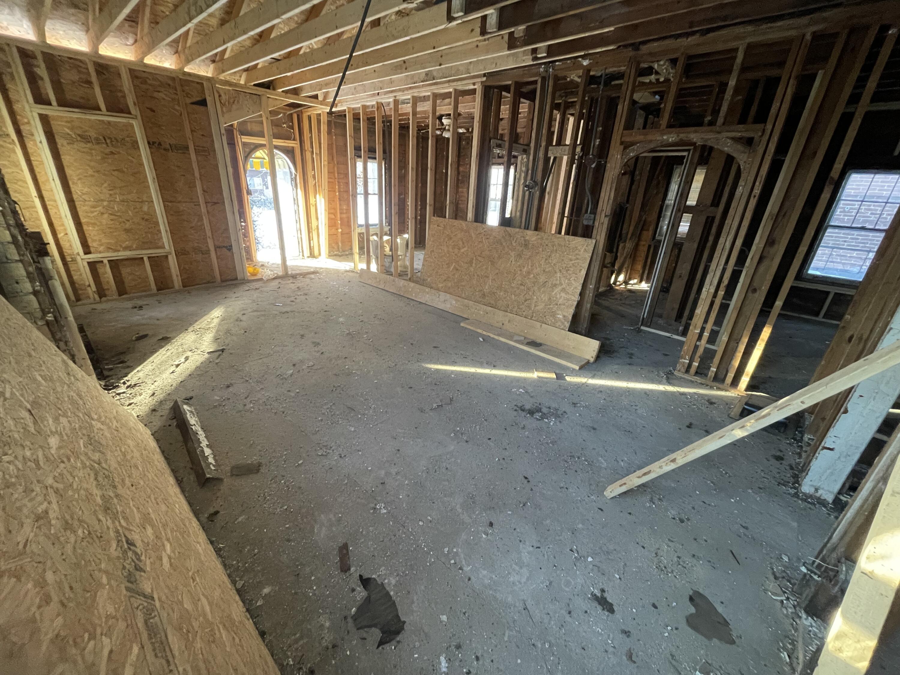 4169 Monroe Street Gary, IN 46408 - Photo 6 of 23 a view of walk in closet with clothes and shoes