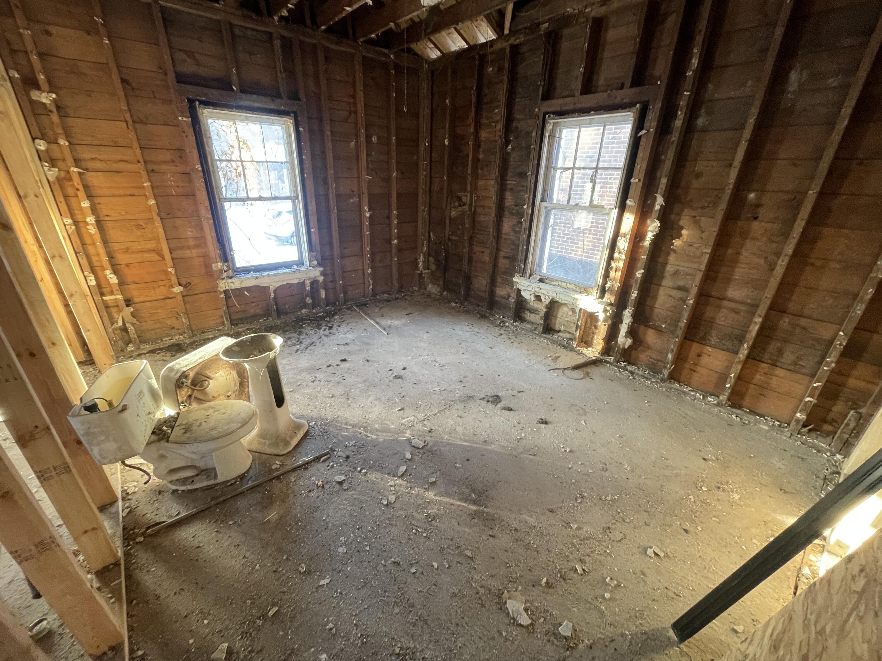 4169 Monroe Street Gary, IN 46408 - Photo 8 of 23 a view of an empty room with a window