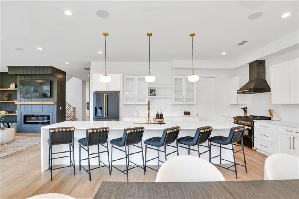1598 Athens Avenue Southwest Atlanta, GA 30310 - Photo 17 of 45 a view of a dining room and livingroom with furniture wooden floor a chandelier