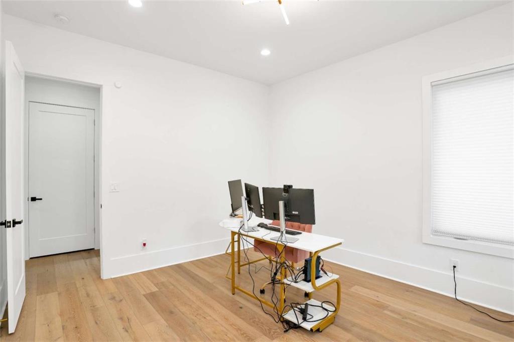 1598 Athens Avenue Southwest Atlanta, GA 30310 - Photo 19 of 45 a view of workspace with wooden floor