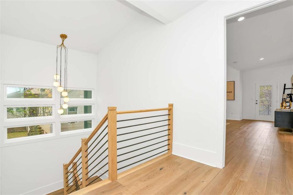 1598 Athens Avenue Southwest Atlanta, GA 30310 - Photo 26 of 45 a view of a room with wooden floor and windows