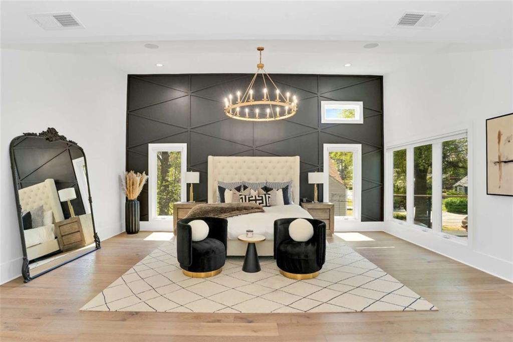 1598 Athens Avenue Southwest Atlanta, GA 30310 - Photo 27 of 45 a living room with furniture a fireplace and a chandelier