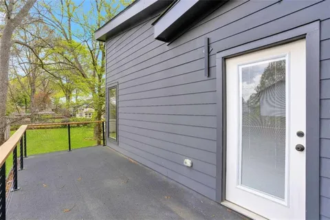 a bedroom with bed and window