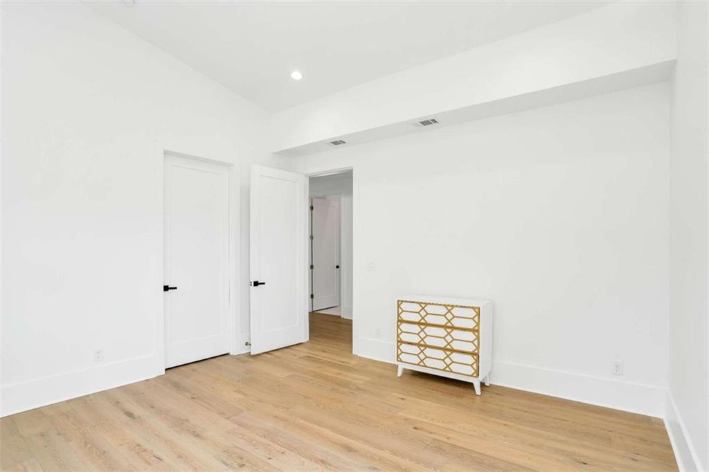 1598 Athens Avenue Southwest Atlanta, GA 30310 - Photo 40 of 45 a view of an empty room with wooden floor