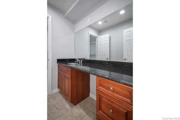 a close view of sink and mirror
