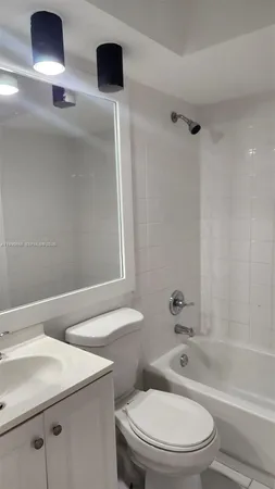 an empty room with wooden floor