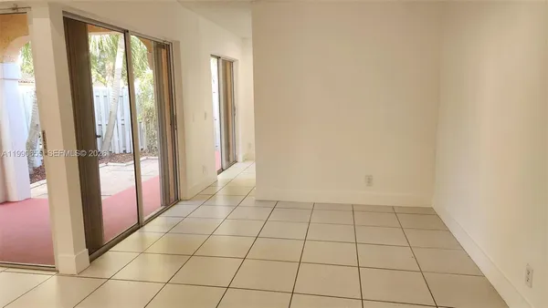 a view of backyard with green space