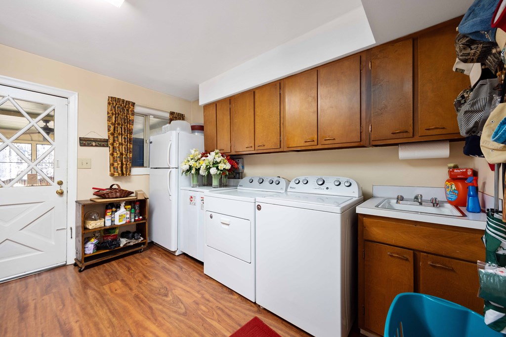 13965 Cross Creek Road Upatoi, GA 31829 - Photo 23 of 44 a room with storage and utility