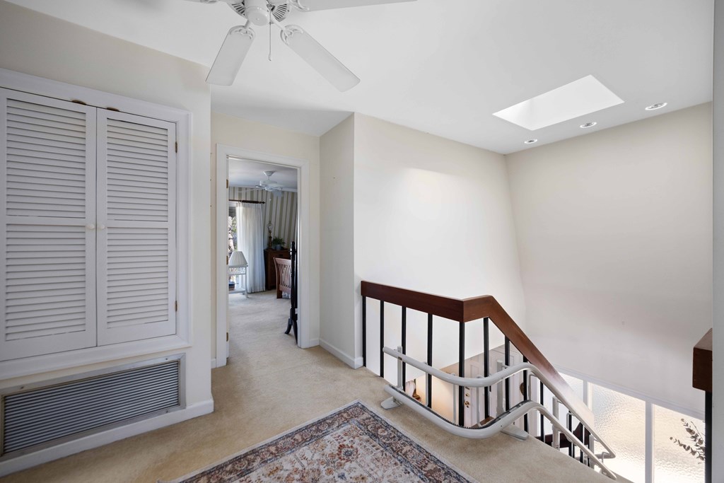 13965 Cross Creek Road Upatoi, GA 31829 - Photo 25 of 44 a view of a hallway with windows and stairs