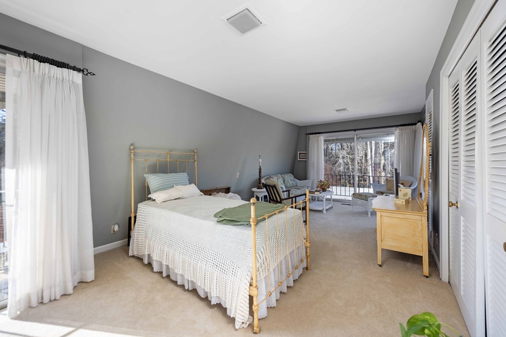 13965 Cross Creek Road Upatoi, GA 31829 - Photo 30 of 44 a bed room with a bed and a couch