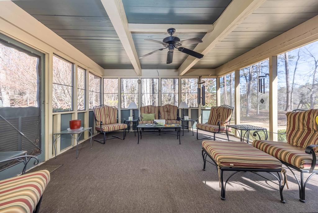 13965 Cross Creek Road Upatoi, GA 31829 - Photo 34 of 44 a living room with furniture and a large window