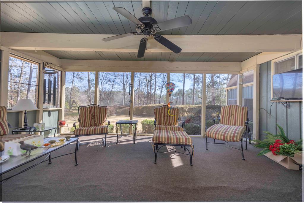 13965 Cross Creek Road Upatoi, GA 31829 - Photo 35 of 44 a living room with furniture and a large window