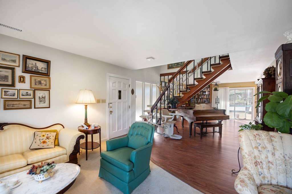 13965 Cross Creek Road Upatoi, GA 31829 - Photo 9 of 44 a living room with furniture and a wooden floor