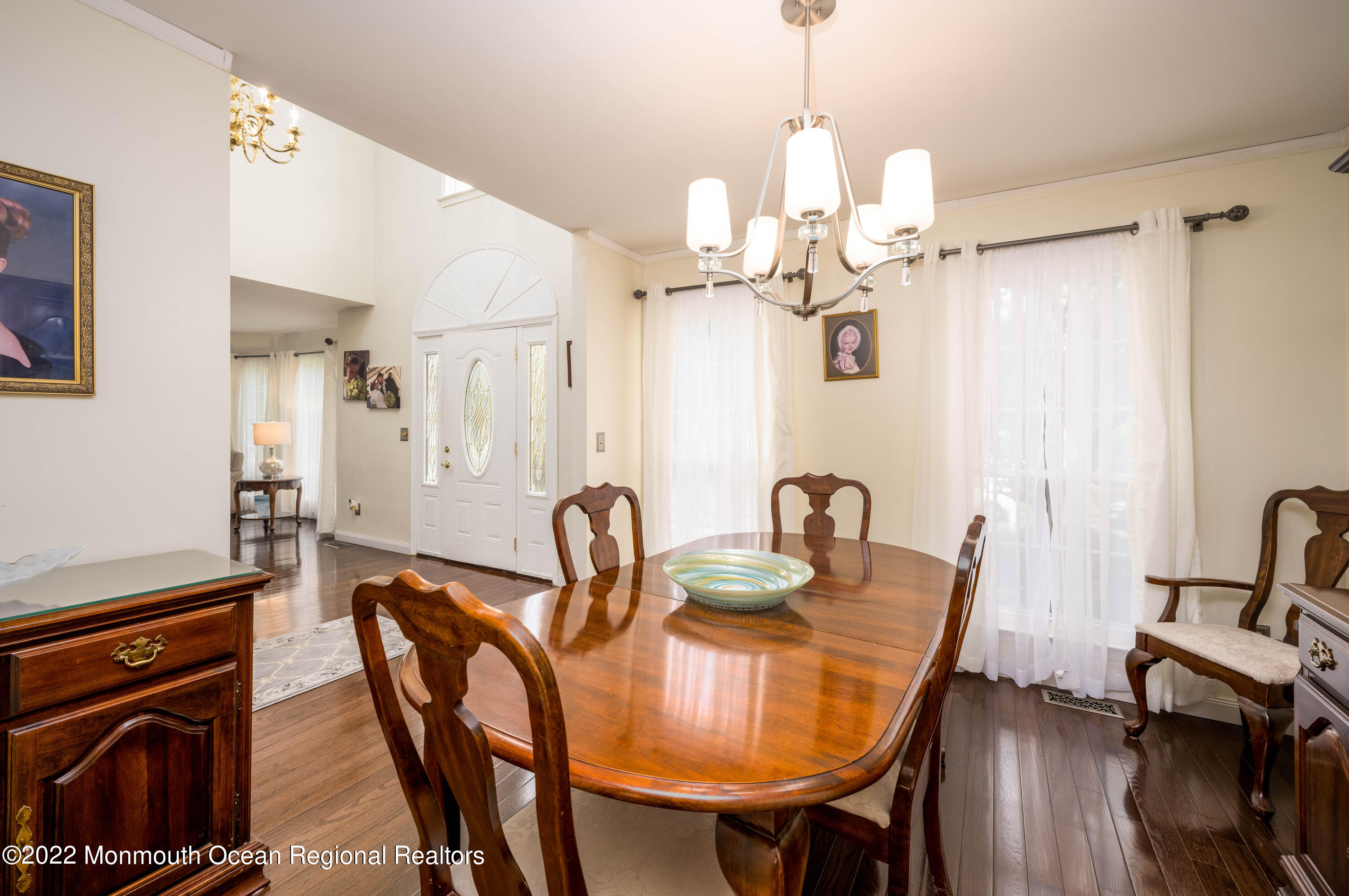 9 Metedeconk Road Howell, NJ 07731 - Photo 11 of 25 a dining room with furniture and wooden floor