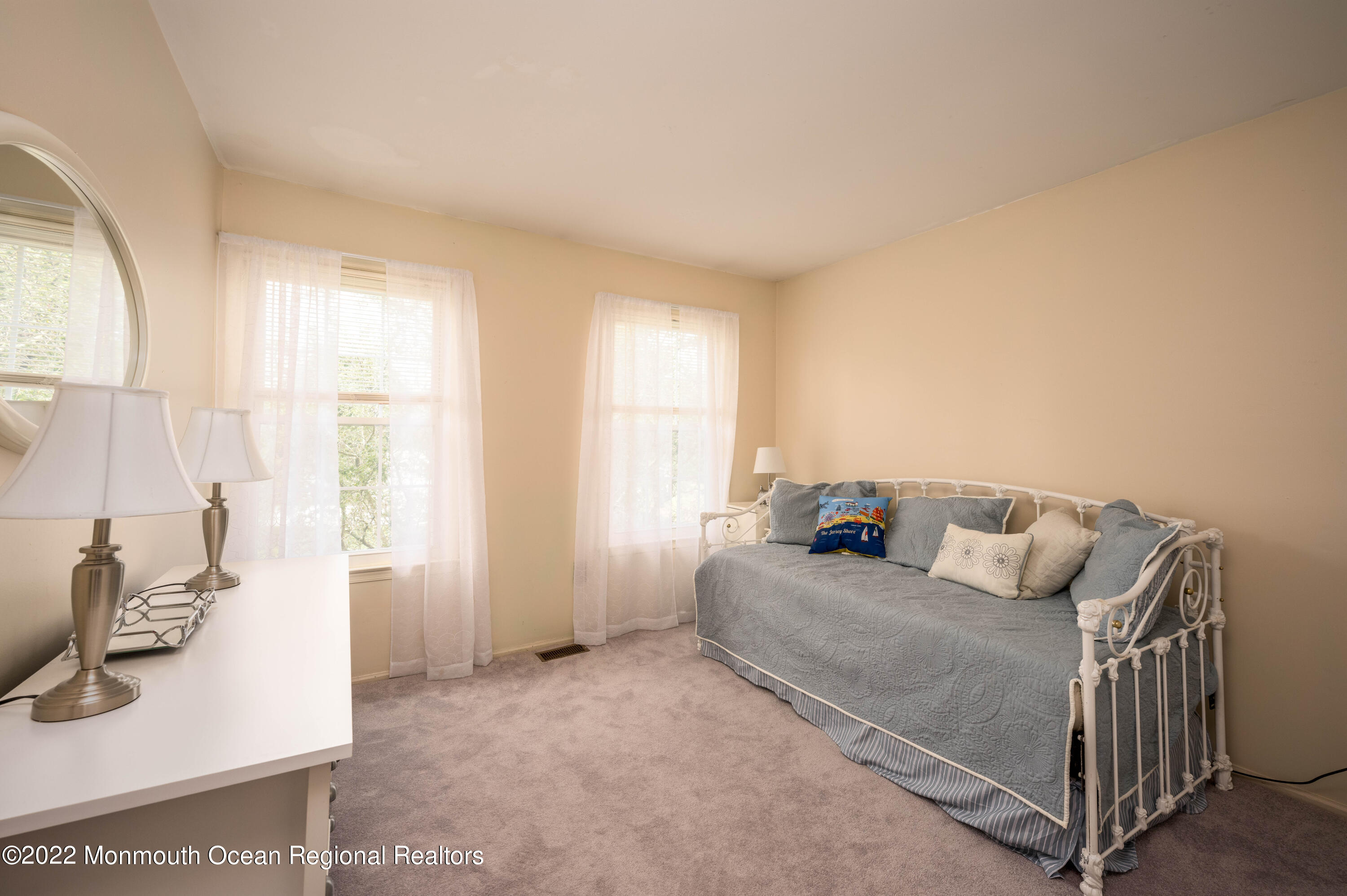 9 Metedeconk Road Howell, NJ 07731 - Photo 13 of 25 a bedroom with a bed and a window