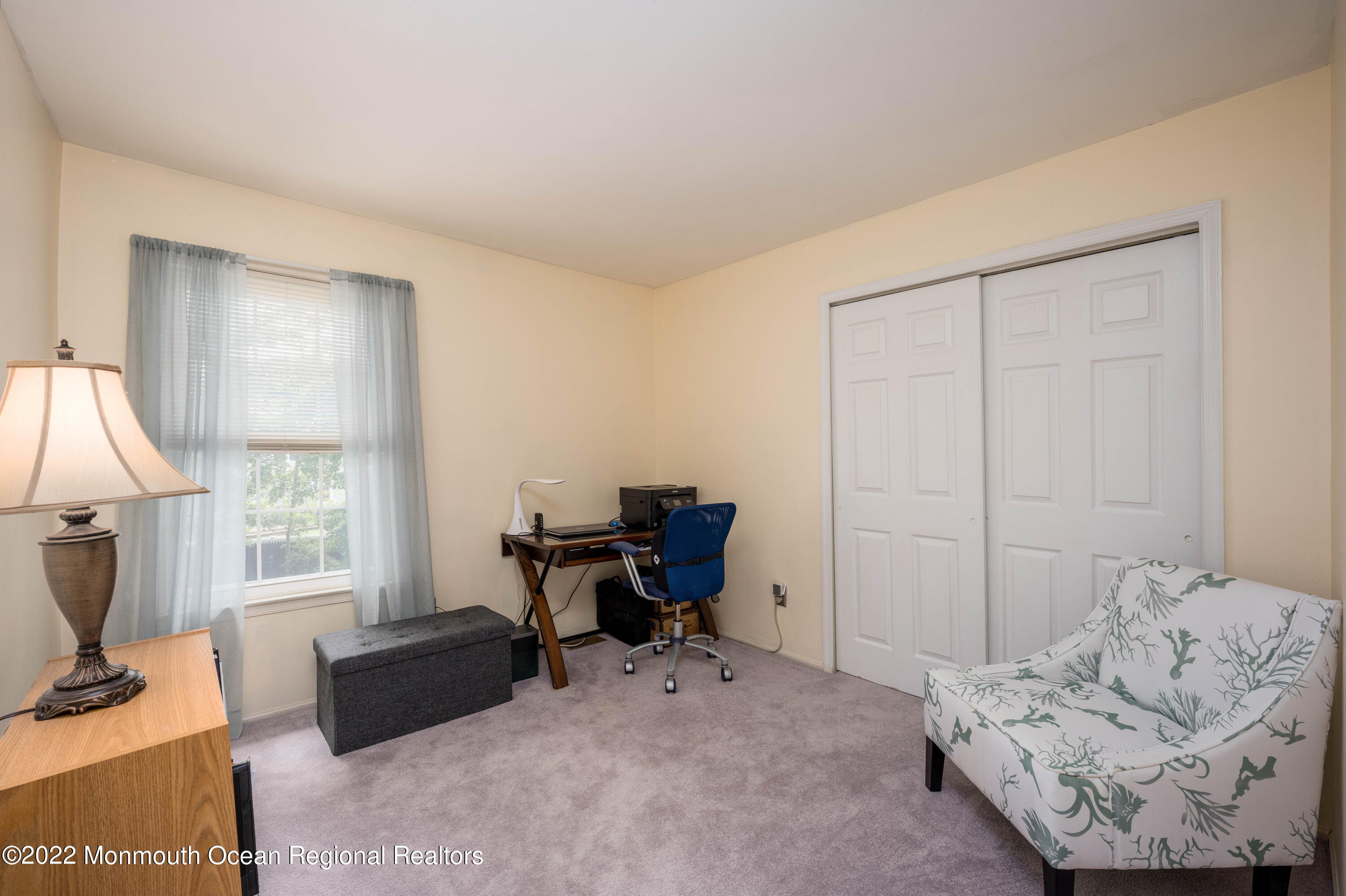 9 Metedeconk Road Howell, NJ 07731 - Photo 16 of 25 a living room with furniture and a window