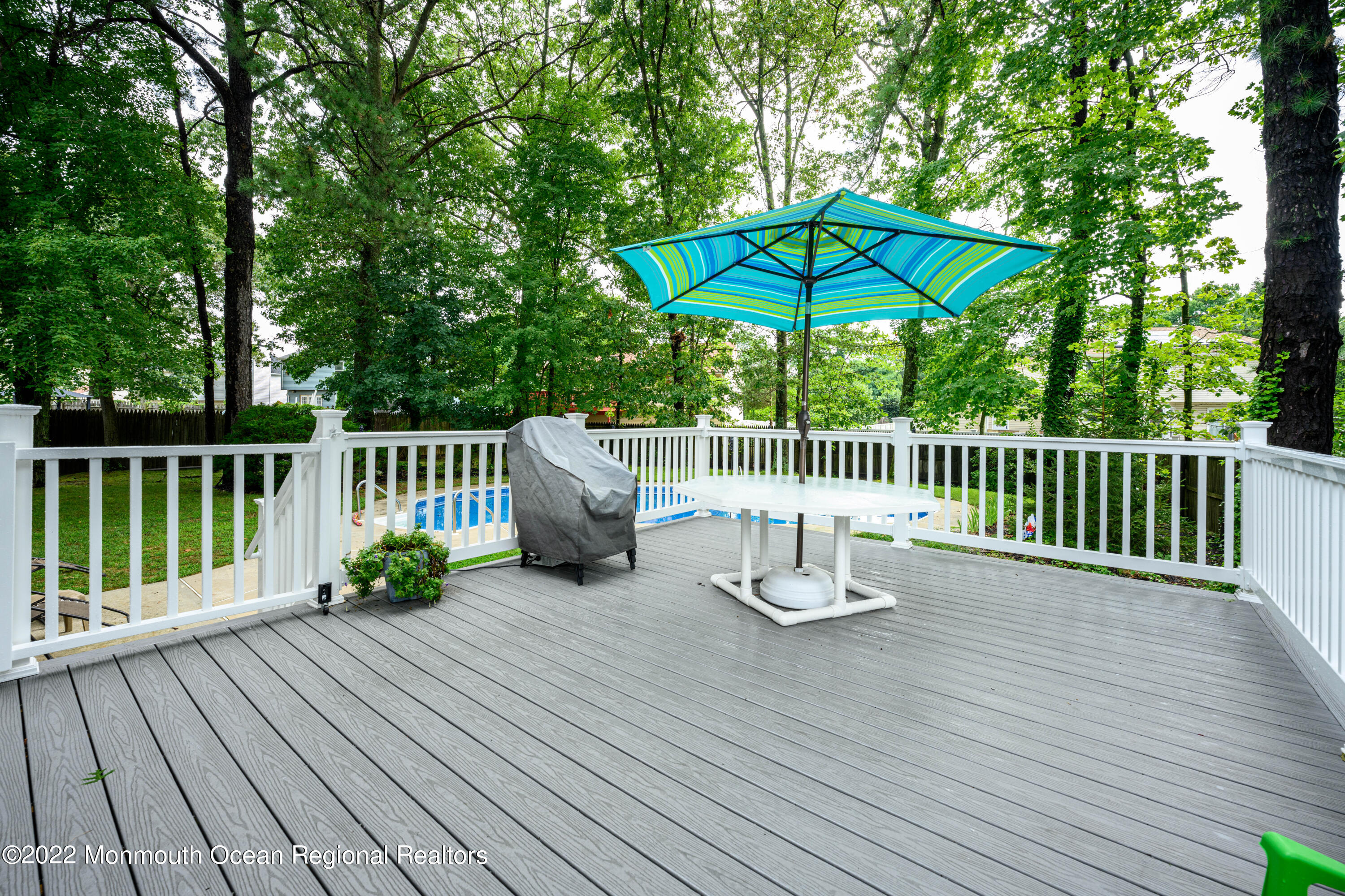 9 Metedeconk Road Howell, NJ 07731 - Photo 17 of 25 a view of balcony with wooden floor and outdoor seating